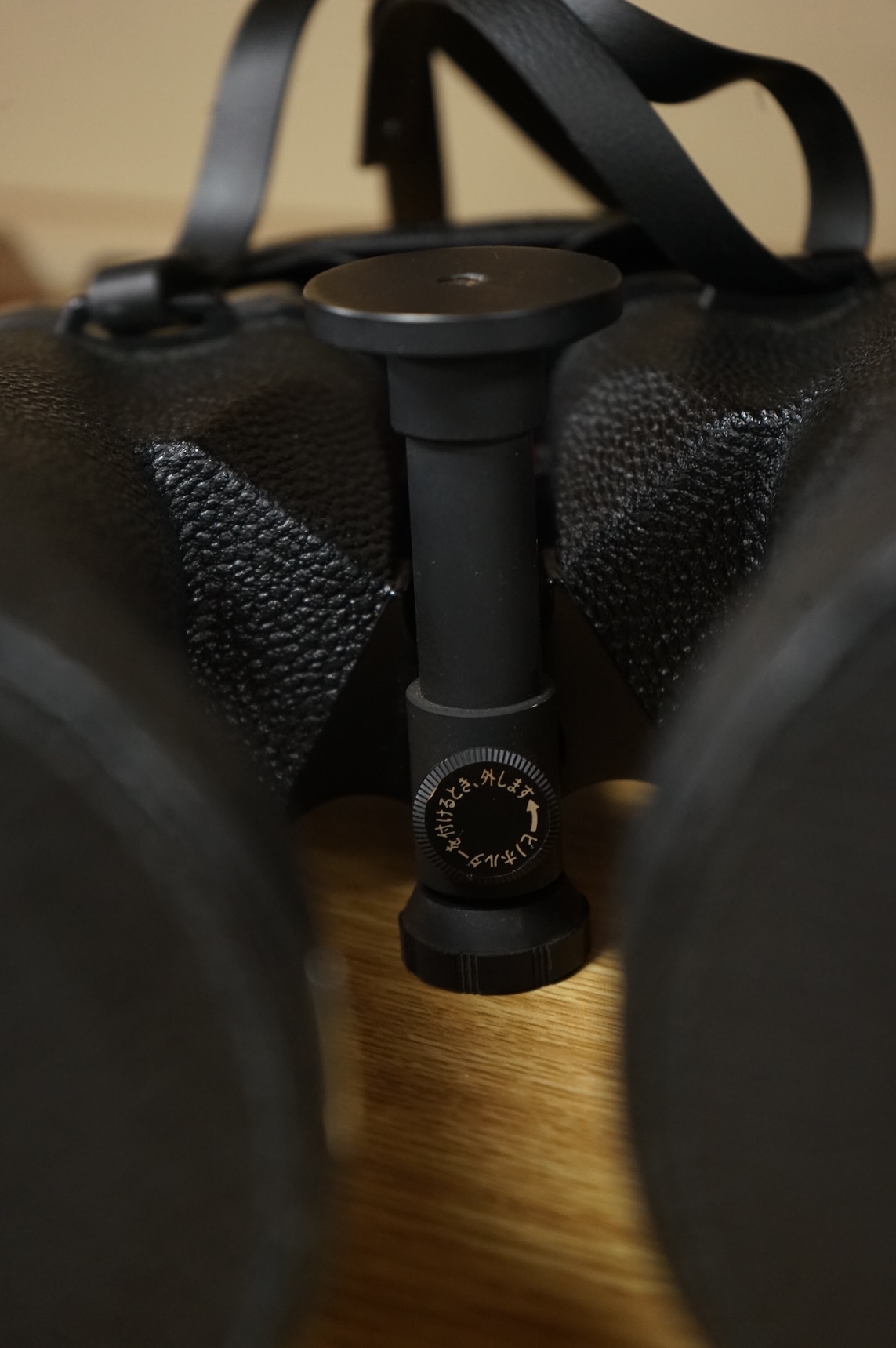 A cased pair of Vixen B Type 10x70 binoculars, stamped ‘Waterproof’, B4 Field 5.3 ‘92M at 1000M’, serial no. 303K050, with rubber shade guards, lens caps and integral tripod mounting, binoculars 27cm long, with the origi
